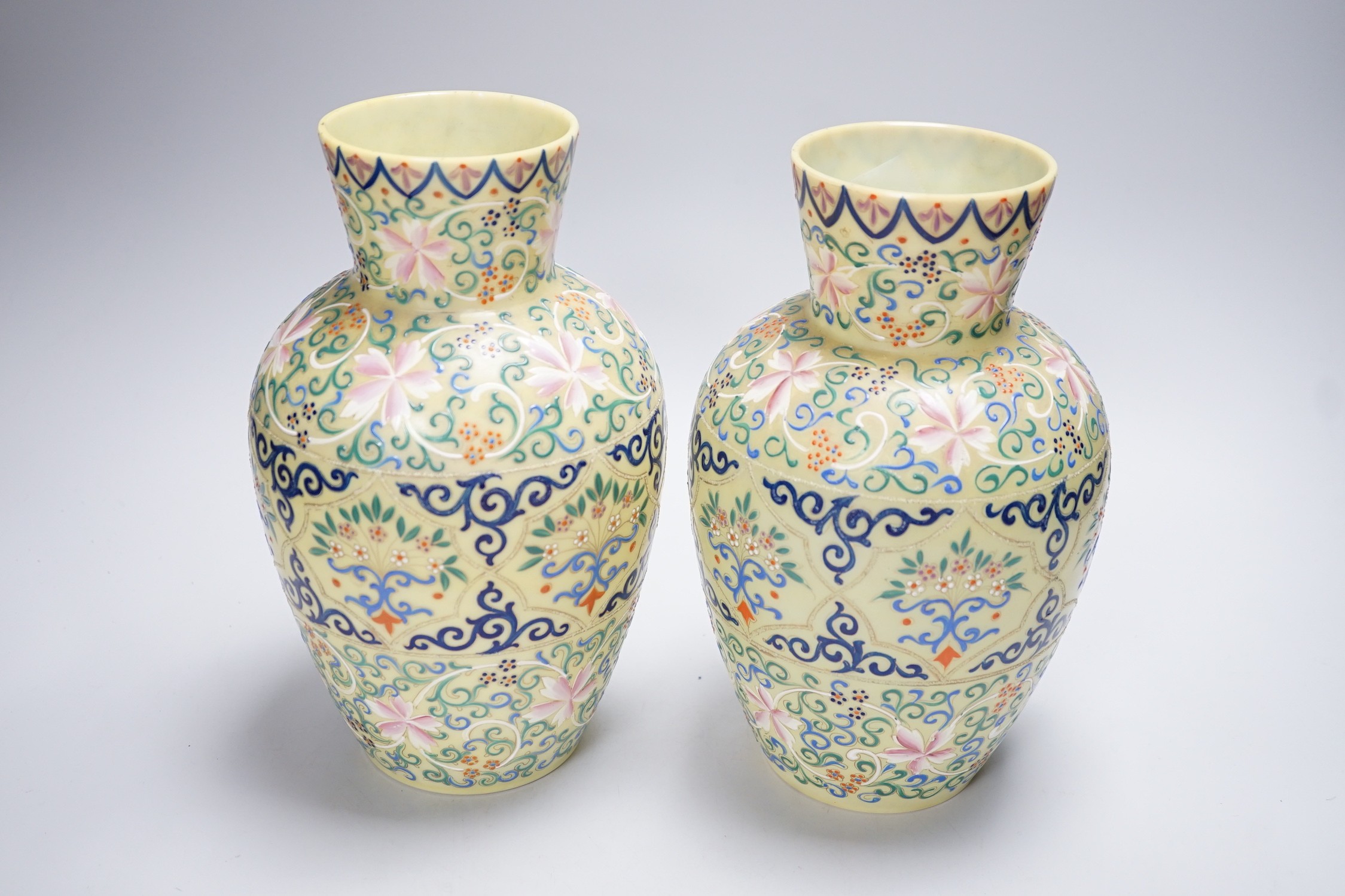 A pair of French enamelled glass vases, Persian inspired, 25.5cm